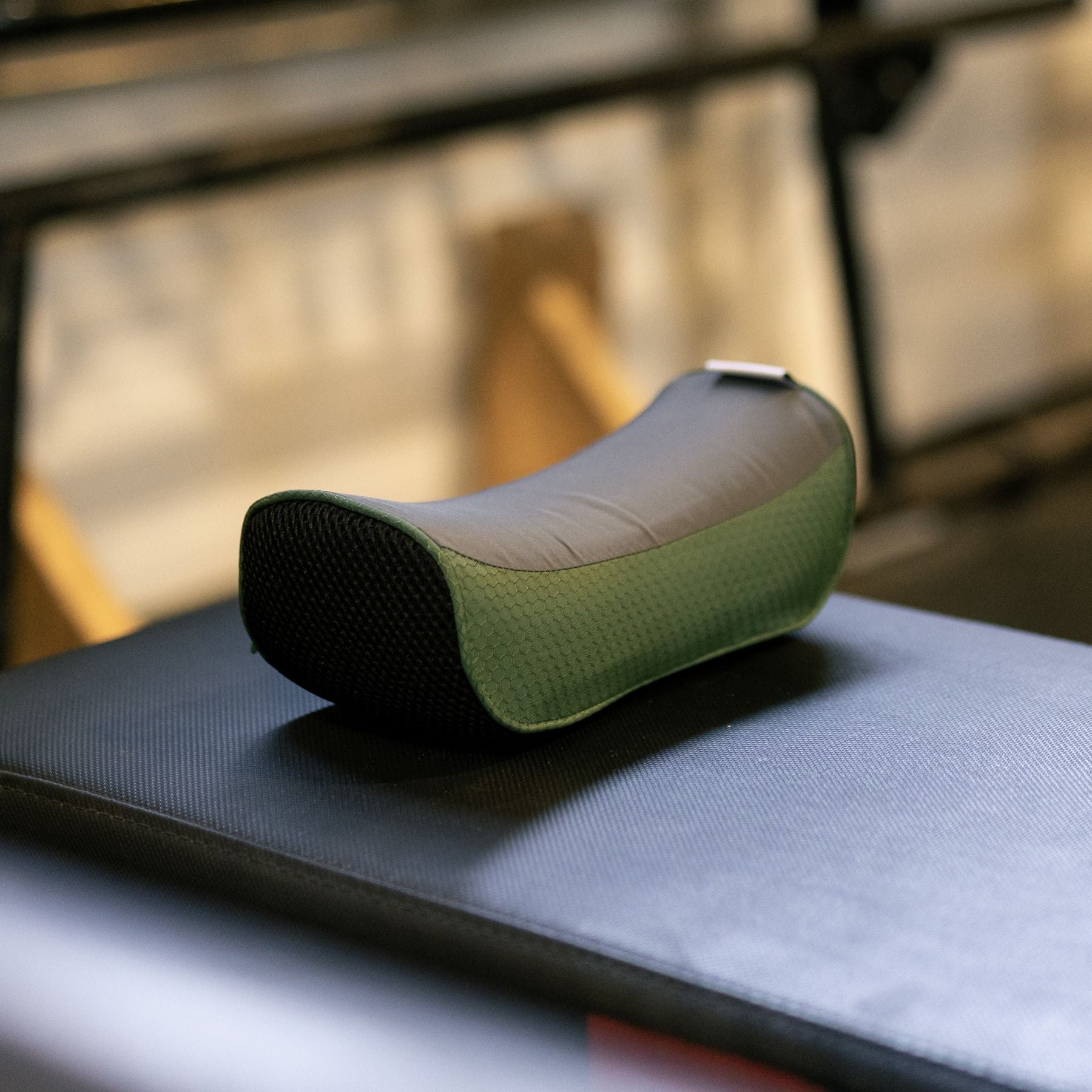 Closeup of the forteneck neck cushion placed on a gym bench